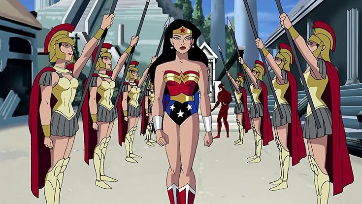Wonder Woman standing before a line of Amazonian warriors.
